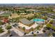 Overhead view of community center, pools, and parks among residential neighborhood at 9645 E Ripple Dr, Mesa, AZ 85212