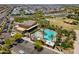 Aerial view of community featuring pool, community center, farms and desert landscape at 9645 E Ripple Dr, Mesa, AZ 85212