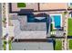 Aerial view of backyard and roof of two story home with swimming pool at 9645 E Ripple Dr, Mesa, AZ 85212