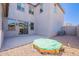 A spacious backyard with a concrete patio area and gravel landscaping at 9645 E Ripple Dr, Mesa, AZ 85212