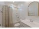 Neat bathroom with a shower and tub combination, and classic fixtures at 9645 E Ripple Dr, Mesa, AZ 85212