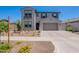 Charming two-story home with a paver driveway, desert landscaping, and neutral paint at 9645 E Ripple Dr, Mesa, AZ 85212