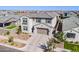 Aerial view of two story home with brick driveway at 9645 E Ripple Dr, Mesa, AZ 85212