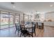 Open-concept kitchen featuring granite countertops, stainless steel appliances, and a seamless connection to the outdoor at 9645 E Ripple Dr, Mesa, AZ 85212