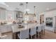 Bright, spacious kitchen with granite countertops, stainless steel appliances, and a large center island at 9645 E Ripple Dr, Mesa, AZ 85212
