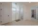 Bright bathroom featuring a glass-enclosed shower and tiled floors at 9645 E Ripple Dr, Mesa, AZ 85212