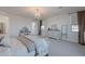 Serene main bedroom with neutral carpet, chandelier, and classic decor at 9645 E Ripple Dr, Mesa, AZ 85212