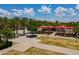 Outdoor restaurant showcasing a spacious patio, with comfortable seating, lush landscaping, and shade at 9645 E Ripple Dr, Mesa, AZ 85212