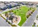 Overhead image of a community park with playground, lush grass, palm trees and modern features at 9645 E Ripple Dr, Mesa, AZ 85212