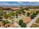 Community playground featuring modern equipment and design, surrounded by lush landscaping and walking paths at 9645 E Ripple Dr, Mesa, AZ 85212