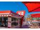 Quaint diner exterior with outdoor seating area under awnings, offering a unique dining experience at 9645 E Ripple Dr, Mesa, AZ 85212