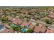 A beautiful aerial neighborhood showcases mature trees, well-maintained lawns, and private pools at 10155 E Wood Dr, Scottsdale, AZ 85260