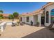 Home exterior featuring a brick-paved patio seating area at 10155 E Wood Dr, Scottsdale, AZ 85260