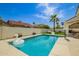 Backyard pool area with beautiful pool, patio area, and landscaping at 10155 E Wood Dr, Scottsdale, AZ 85260