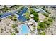 A high-angle aerial shot showcasing the community amenities: pool, tennis court, and parking at 10572 E Autumn Sage Dr, Scottsdale, AZ 85255