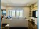 Beautiful living room with outdoor access and hardwood floors throughout at 10572 E Autumn Sage Dr, Scottsdale, AZ 85255