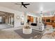 Open-concept floor plan featuring a living space that blends into kitchen and dining areas at 11193 N 121St Way, Scottsdale, AZ 85259