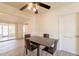 Open-concept dining space features neutral walls, newer floors, and access to backyard patio at 1124 S Longwood Loop, Mesa, AZ 85208