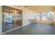 Enclosed patio with seating area, providing an ideal space for relaxation at 1124 S Longwood Loop, Mesa, AZ 85208