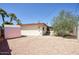 Backyard with a shed, desert plants, gravel, brick pavers and block fence at 12220 N 22Nd Pl, Phoenix, AZ 85022