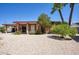Charming single-story home featuring well-kept landscaping and classic desert style features at 12220 N 22Nd Pl, Phoenix, AZ 85022