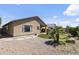 Backyard featuring desert landscaping and a putting green, perfect for outdoor entertaining at 12732 S 175Th Dr, Goodyear, AZ 85338