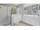 Bright bathroom featuring a separate shower, soaking tub, and double vanity with stylish fixtures at 12732 S 175Th Dr, Goodyear, AZ 85338