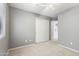 Light and airy bedroom with a ceiling fan and double door closet at 12732 S 175Th Dr, Goodyear, AZ 85338