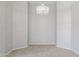 Neutral dining room area featuring a modern chandelier, and carpet flooring at 12732 S 175Th Dr, Goodyear, AZ 85338
