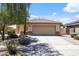 Charming single-Gathering home with a well-maintained front yard and a two-car garage at 12732 S 175Th Dr, Goodyear, AZ 85338