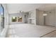 Bright and airy living room with vaulted ceilings, carpet flooring, and large windows at 12732 S 175Th Dr, Goodyear, AZ 85338