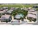 Aerial view showcasing community pool, clubhouse, and well-maintained residential area at 14870 W Encanto Blvd # 1038, Goodyear, AZ 85395