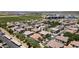A serene neighborhood displays homes with well-manicured lawns and consistent architectural design at 14870 W Encanto Blvd # 1038, Goodyear, AZ 85395