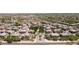 Panoramic aerial view of a meticulously planned community with lush greenery, well-spaced homes, and inviting streets at 14870 W Encanto Blvd # 1038, Goodyear, AZ 85395