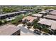 Aerial view of a home in a well-planned community with beautiful landscaping, sidewalks and mature trees at 14870 W Encanto Blvd # 1038, Goodyear, AZ 85395