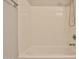 This bathroom features a shower and tub combination with white tiling at 14870 W Encanto Blvd # 1038, Goodyear, AZ 85395