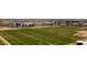Expansive view of nearby land with buildings, providing potential development and neighborhood connectivity at 14870 W Encanto Blvd # 1038, Goodyear, AZ 85395