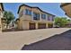 This parking area is located in front of garages in a three-story home at 14870 W Encanto Blvd # 1038, Goodyear, AZ 85395