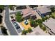 Community playground with colorful equipment, surrounded by green spaces and parking for convenient Gathering fun at 14870 W Encanto Blvd # 1038, Goodyear, AZ 85395