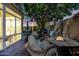 Cozy backyard retreat with a fire pit, comfortable seating, and views of the sunset at 15411 S 13Th Ave, Phoenix, AZ 85045
