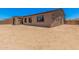 The backyard showcases ample space, perfect for custom landscaping and outdoor entertainment at 17308 W Royal Palm Rd, Waddell, AZ 85355