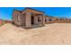 The backyard offers a covered patio and abundant space to create your own outdoor oasis at 17308 W Royal Palm Rd, Waddell, AZ 85355