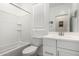 Bathroom featuring a bath tub, shower, toilet, vanity and white cabinets creating a clean space at 19751 W Adams St, Buckeye, AZ 85326