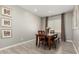 Inviting dining room featuring a wooden table with seating for four at 19751 W Adams St, Buckeye, AZ 85326