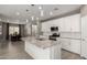 Modern kitchen with granite countertops, stainless steel appliances, and ample storage at 19751 W Adams St, Buckeye, AZ 85326