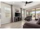 Cozy living room with tile floors, neutral colors, and lots of natural light at 19751 W Adams St, Buckeye, AZ 85326