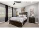 Cozy bedroom featuring a queen-sized bed, plush carpeting, and natural light at 19751 W Adams St, Buckeye, AZ 85326