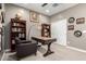 Office featuring a desk, chair, bookcases and natural lighting offering a productive space at 19751 W Adams St, Buckeye, AZ 85326