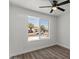 Bedroom features a large window providing natural light and neighborhood views at 2036 W Windrose Dr, Phoenix, AZ 85029