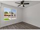 Bedroom features a large window providing natural light and neighborhood views at 2036 W Windrose Dr, Phoenix, AZ 85029